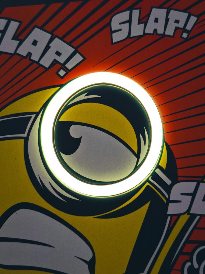 Exclusive Minions Comic LED Wall Art - Transform your space with this playful animated wall decor featuring the iconic yellow characters in comic strip style. Perfect for animation fans and kids' rooms!