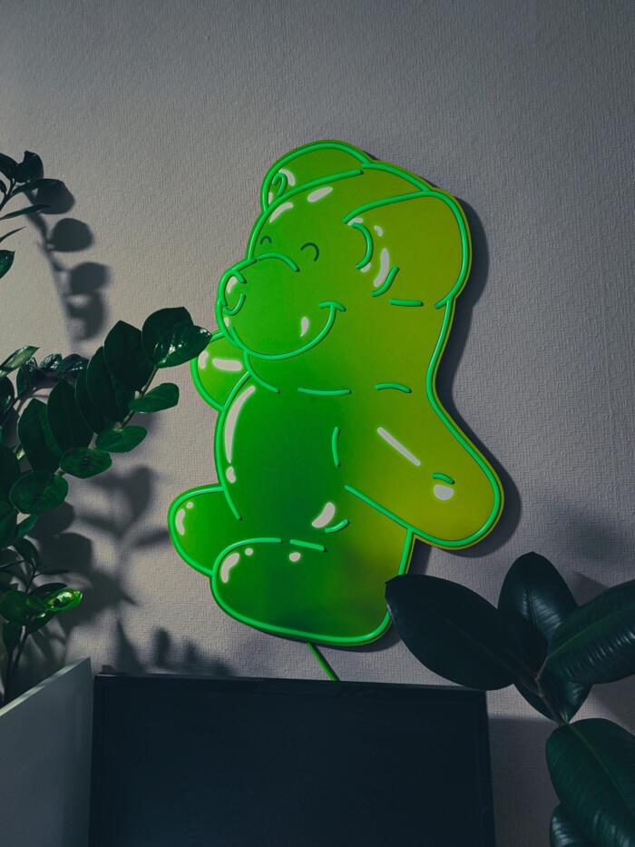 Embrace the sweet nostalgia of candy culture with this Green “Gummy Bear” neon artwork. A must-have LED wall piece for candy lovers, retro enthusiasts, and those who appreciate bold, playful decor with vibrant color impact.